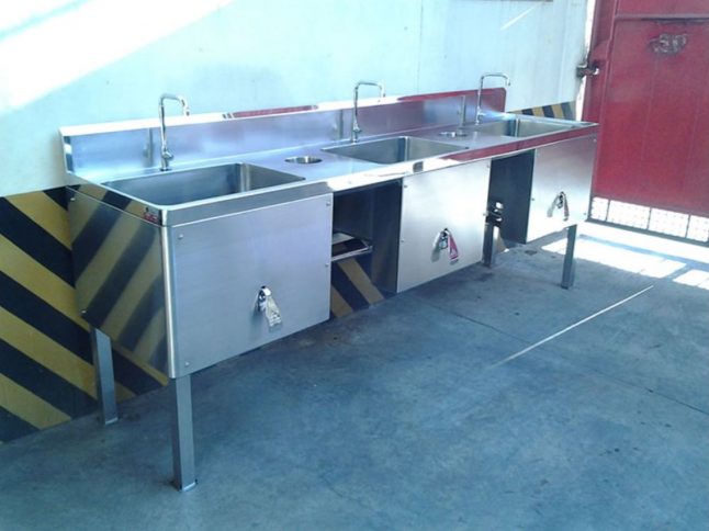 Steel metal punching on a sink by Astron metal